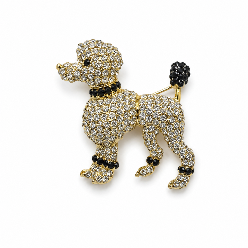 Broche cachorro dourado com strass e pedras pretas, formato de patinhas