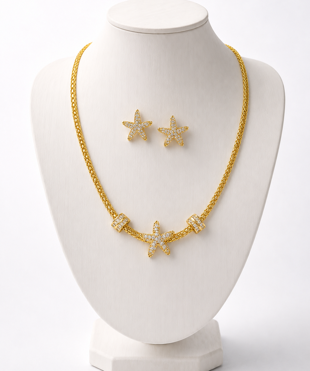 Conjunto de colar e brinco com pingentes de estrelas, tom dourado
