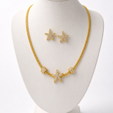 Conjunto de colar e brinco com pingentes de estrelas, tom dourado