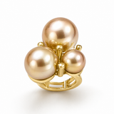 Anel 3 Marias dourado com três pérolas brilhantes e aro fechado.