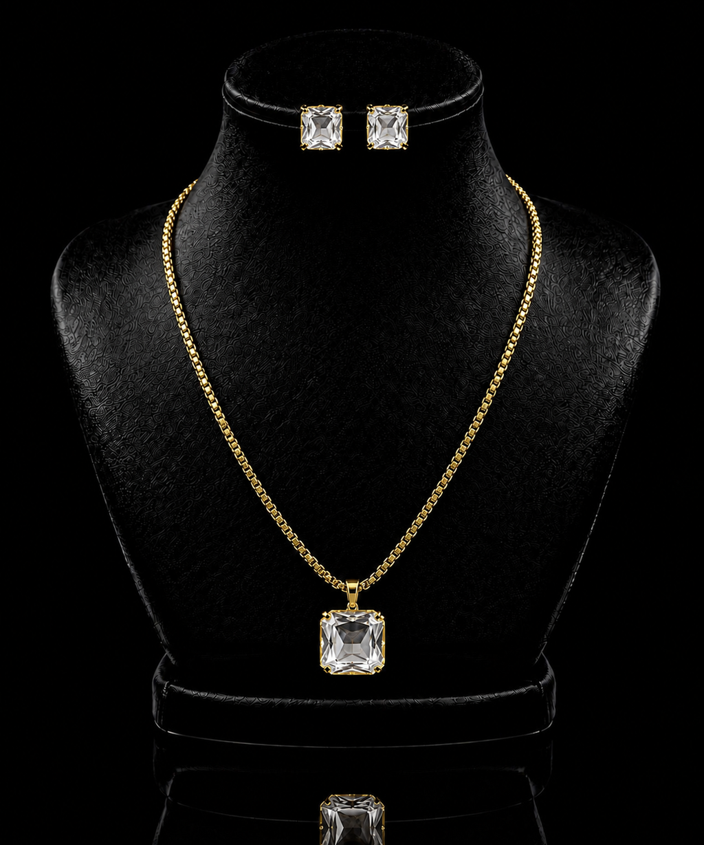 Conjunto de colar e brinco Aurélia com cristais quadrados transparentes e banho dourado