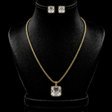 Conjunto de colar e brinco Aurélia com cristais quadrados transparentes e banho dourado