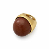 Anel Nuria com aro dourado e pedra oval marrom lisa