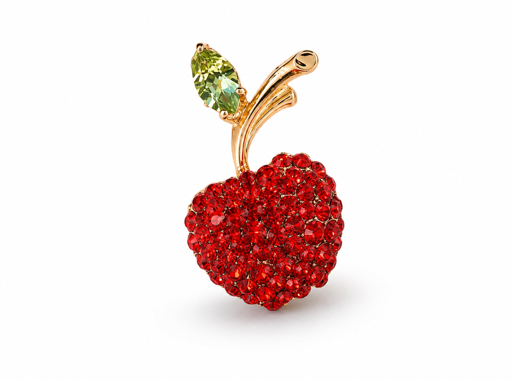 Broche de cereja com strass vermelhos, folha verde e haste dourada em arco