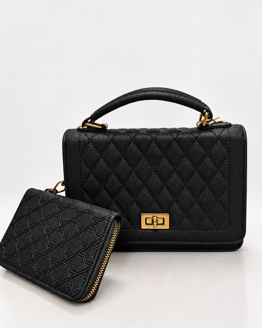 Bolsa preta com acabamento matelassê, alça superior e fecho dourado; acompanha carteira.