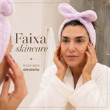 Faixa de cuidados com a pele rosa em tecido felpudo com laço para prender no cabelo