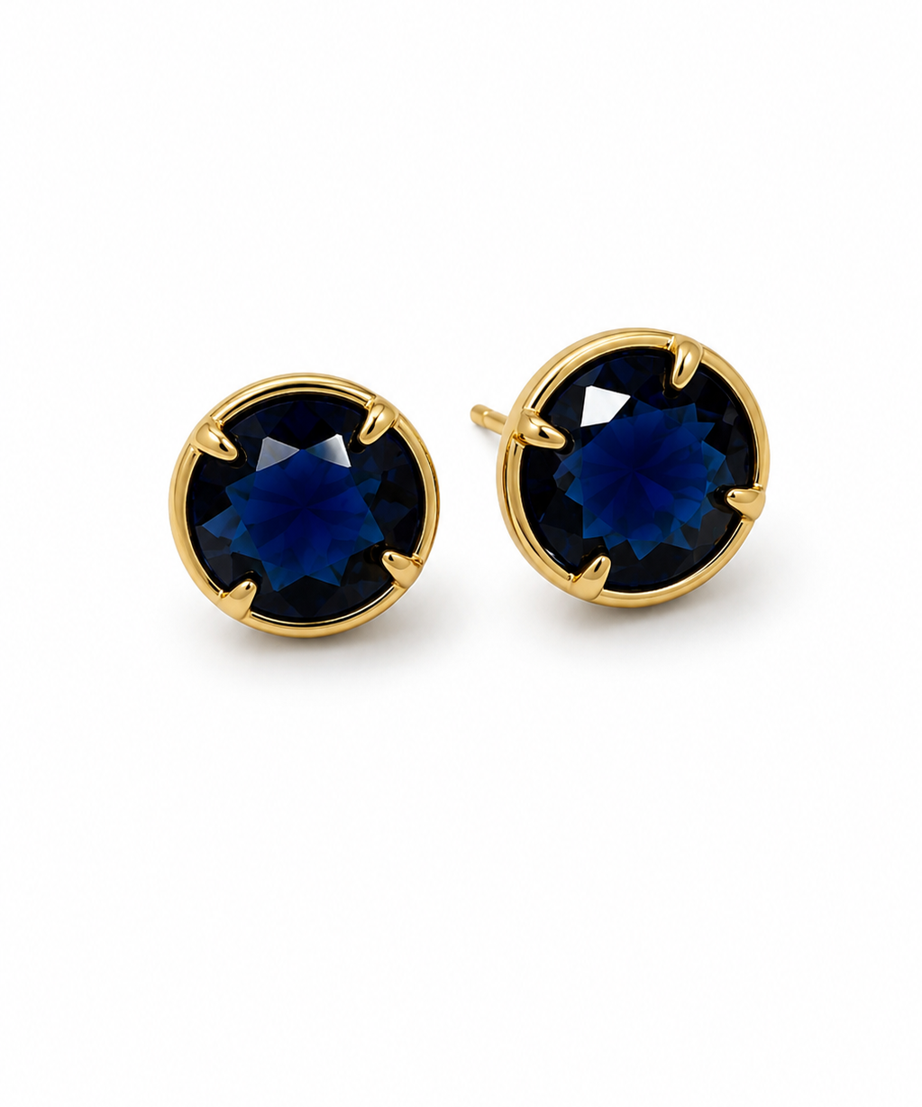 Par de brincos com pedra cristal azul-marinho e aro dourado
