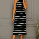 Vestido midi regata Justine preto com listras onduladas brancas e saia evasê