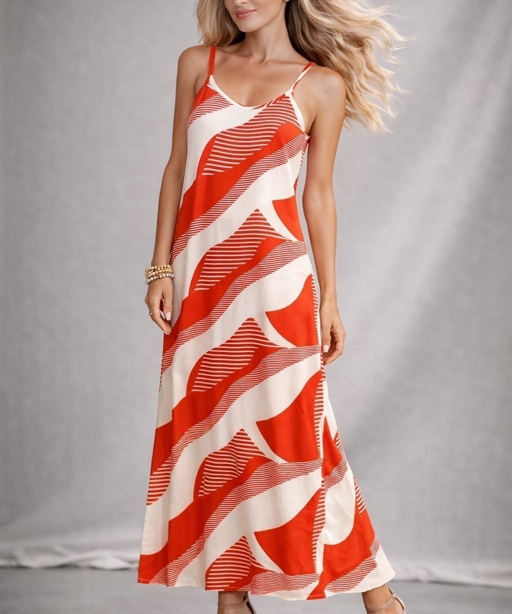 Vestido longo de alças finas vermelho e branco com estampa listrada ondulada