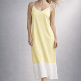 Vestido midi de alças finas amarelo claro com recorte e barra branca