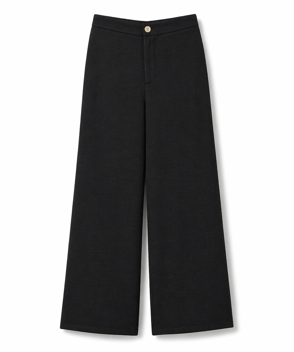 Calça Aurora preta de cintura alta, pernas amplas, fecho frontal com botão dourado