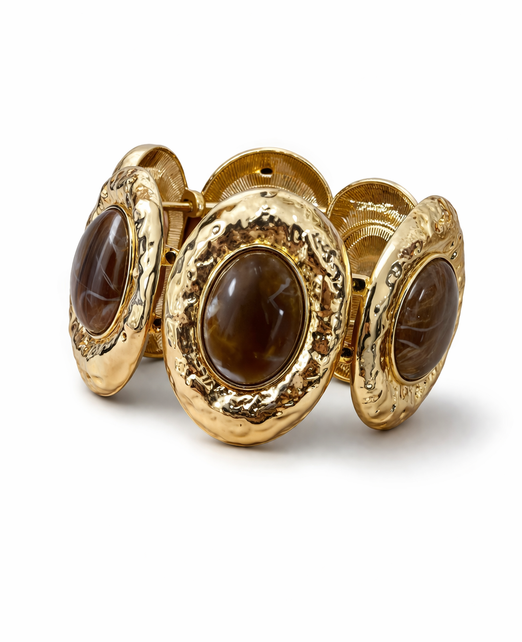 Pulseira de metal dourado com três pedras ovais marrom