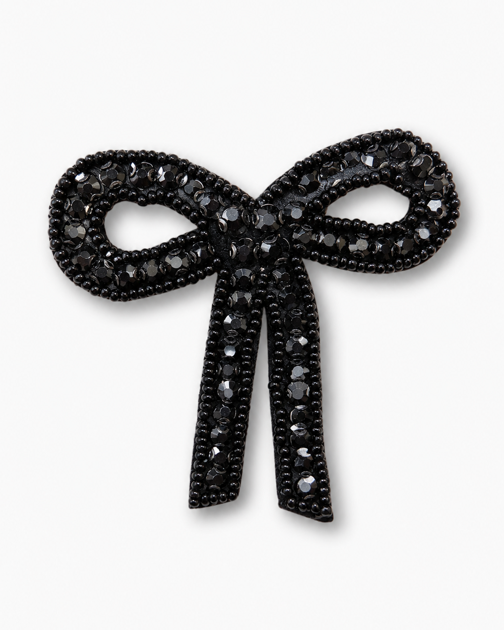 Broche em forma de laço com strass preto