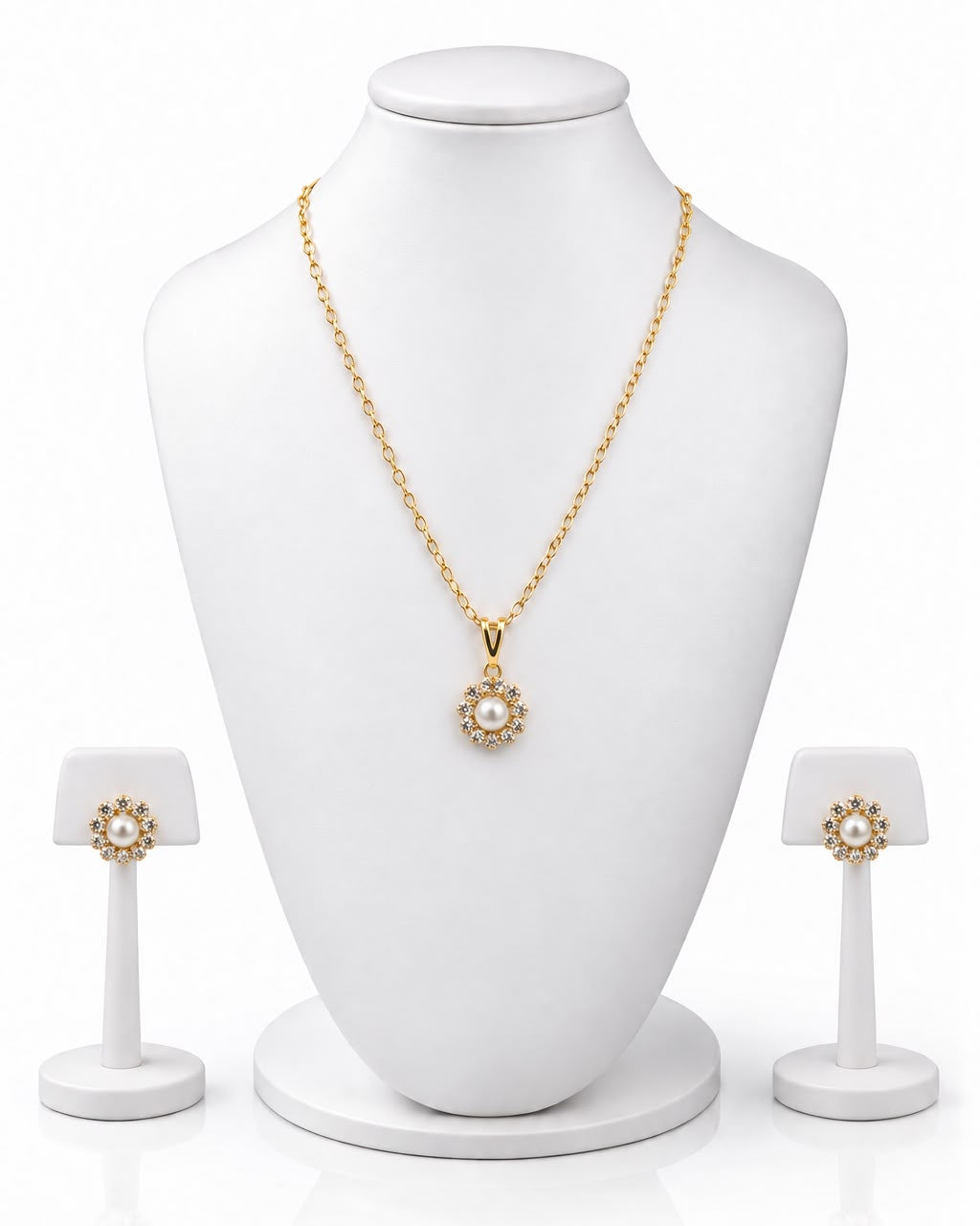 Conjunto lila: colar dourado com pingente floral e brincos combinando