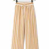 Calça pantalona listrada bege e branca, cós elástico com cordão e modelagem ampla