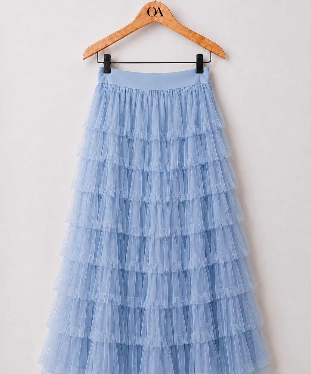 Saia de tule azul clara com camadas em babados e cós elástico