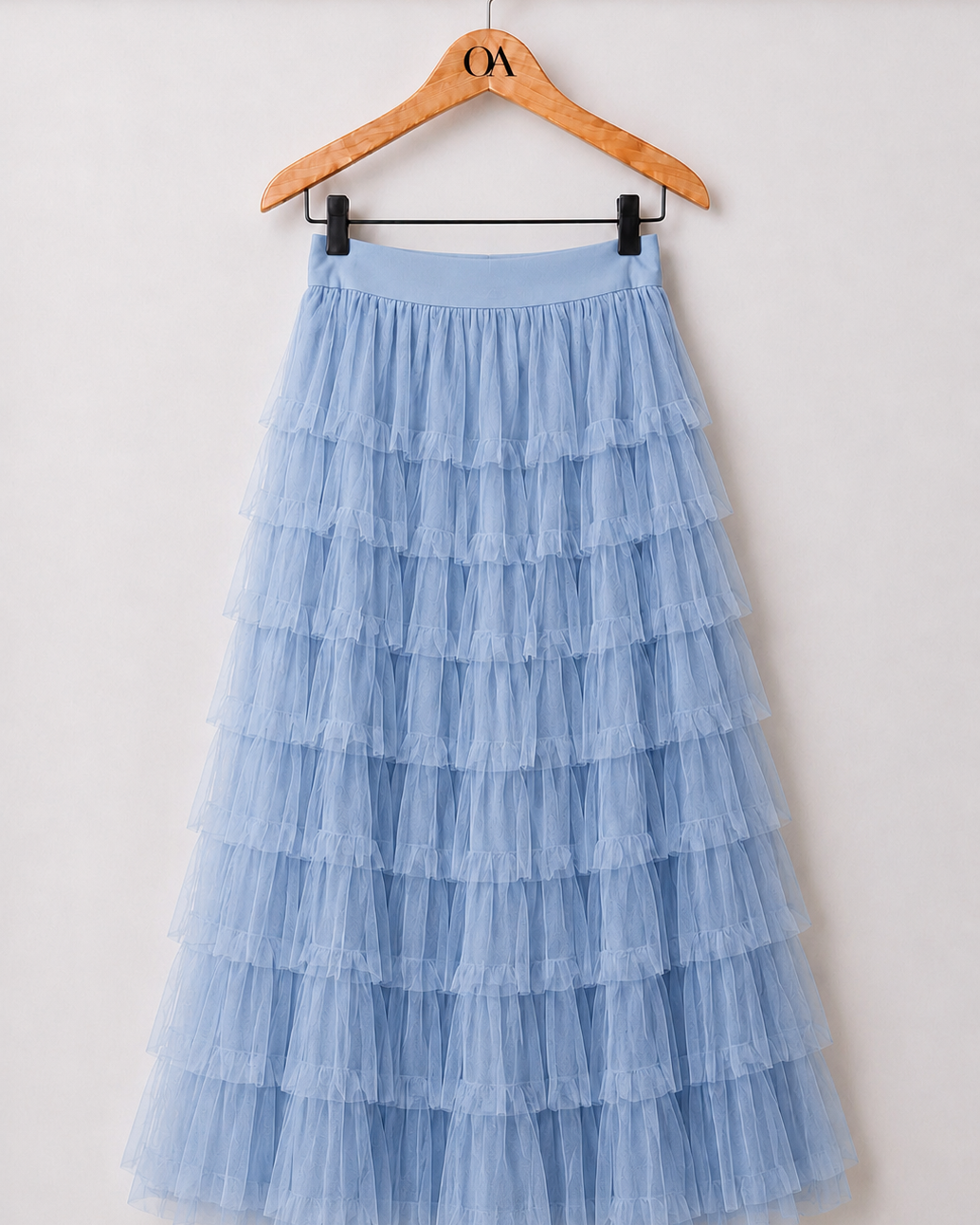 Saia de tule azul clara com camadas em babados e cós elástico