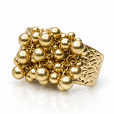 Pulseira Valina dourada com contas esféricas e placa texturizada