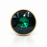 Anel dourado com pedra redonda escura e brilho facetado verde