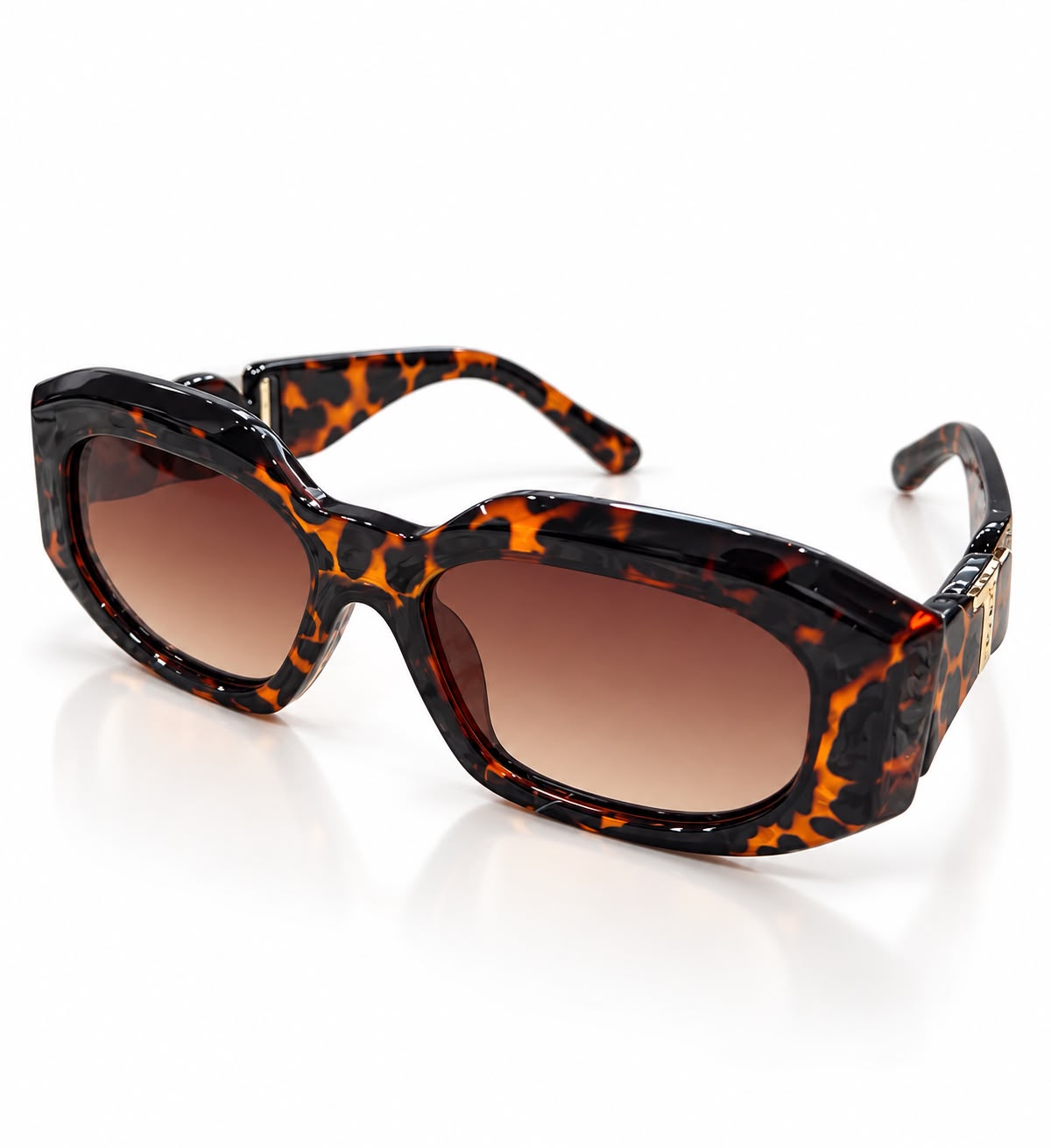 Óculos de armação tartaruga com lentes marrons, formato oval