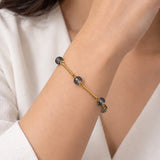 Pulseira Ana Celia Grafite com contas escuras e banho dourado