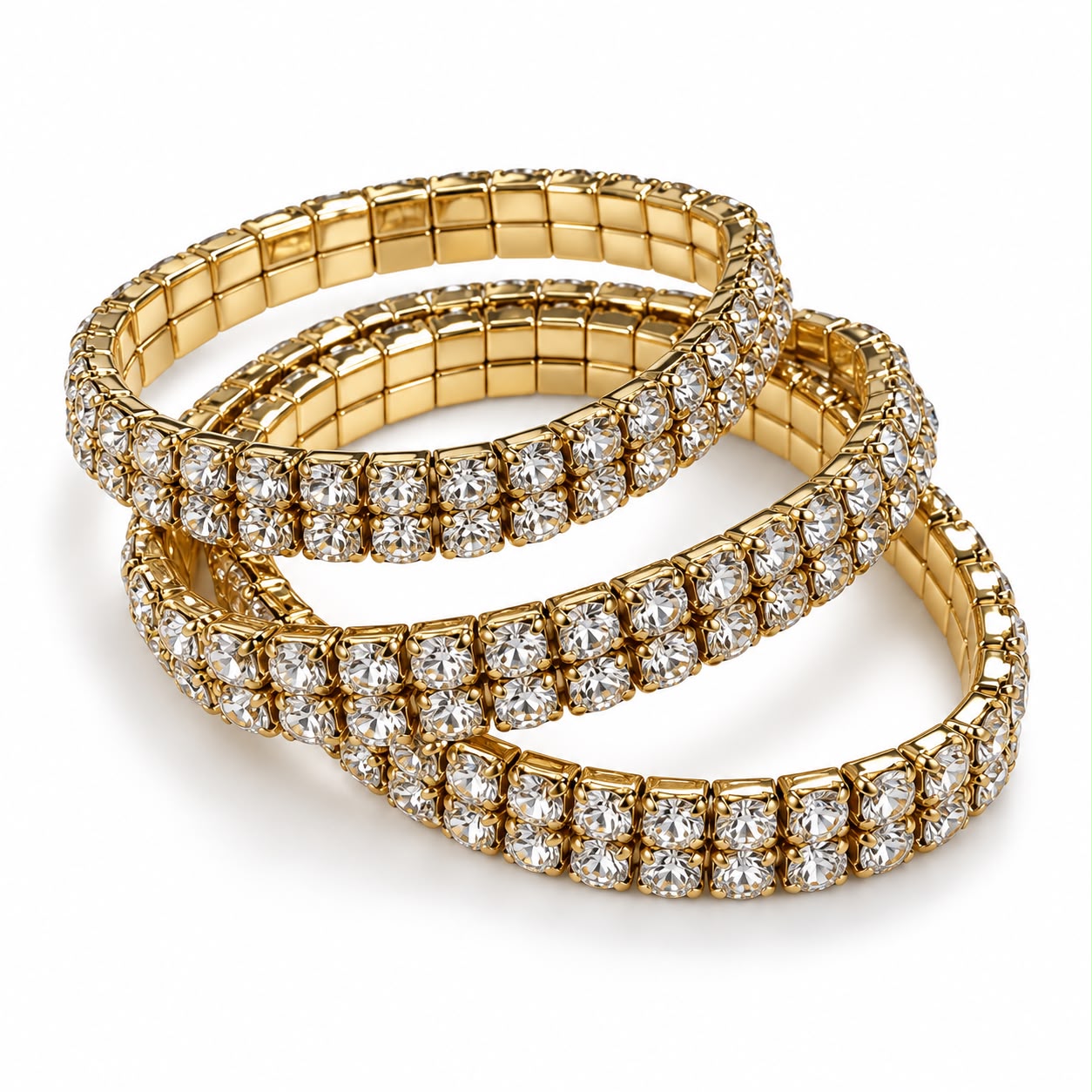 Conjunto de três pulseiras Nina Gold com elos dourados e fileira de cristais.