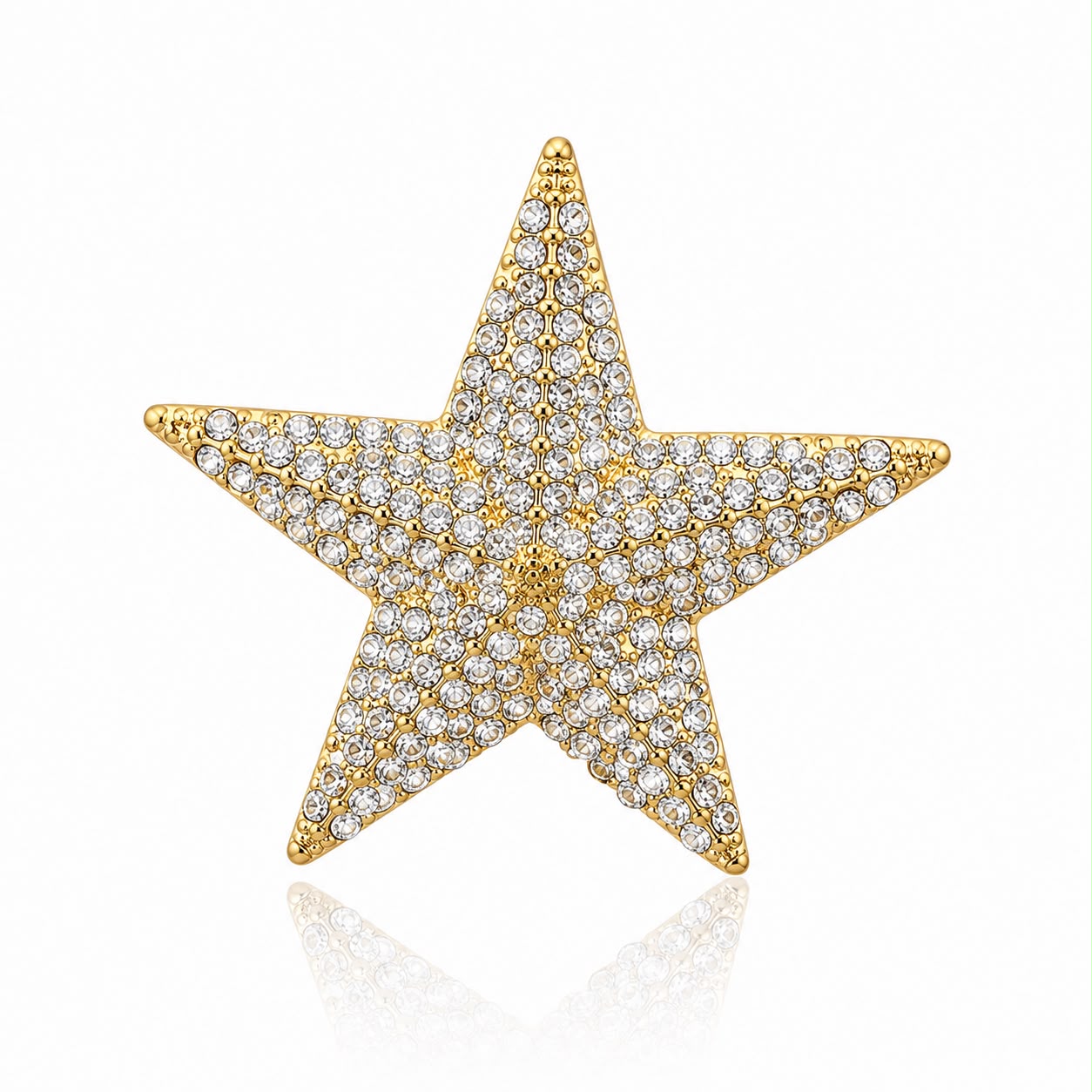 Broche estrela com cristais brilhantes em tom dourado, formato de estrela completa.