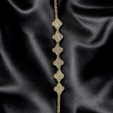 Pulseira Dani Cleef premium dourada com pingentes em losangos brilhantes