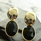 Brinco Viena dourado com pedra preta oval, pendente