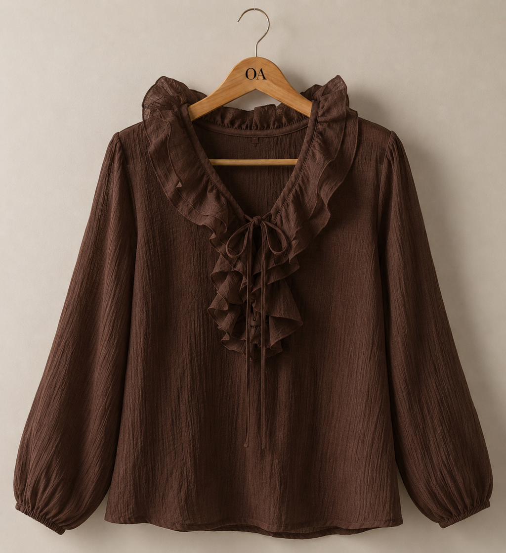 Blusa marrom com gola de babados e frente abotoável, mangas bufantes