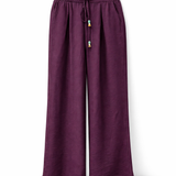Calça Suzana beterraba de caimento solto, cintura elástica e cordão