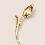 Broche de tulipa dourado em formato 3D com haste