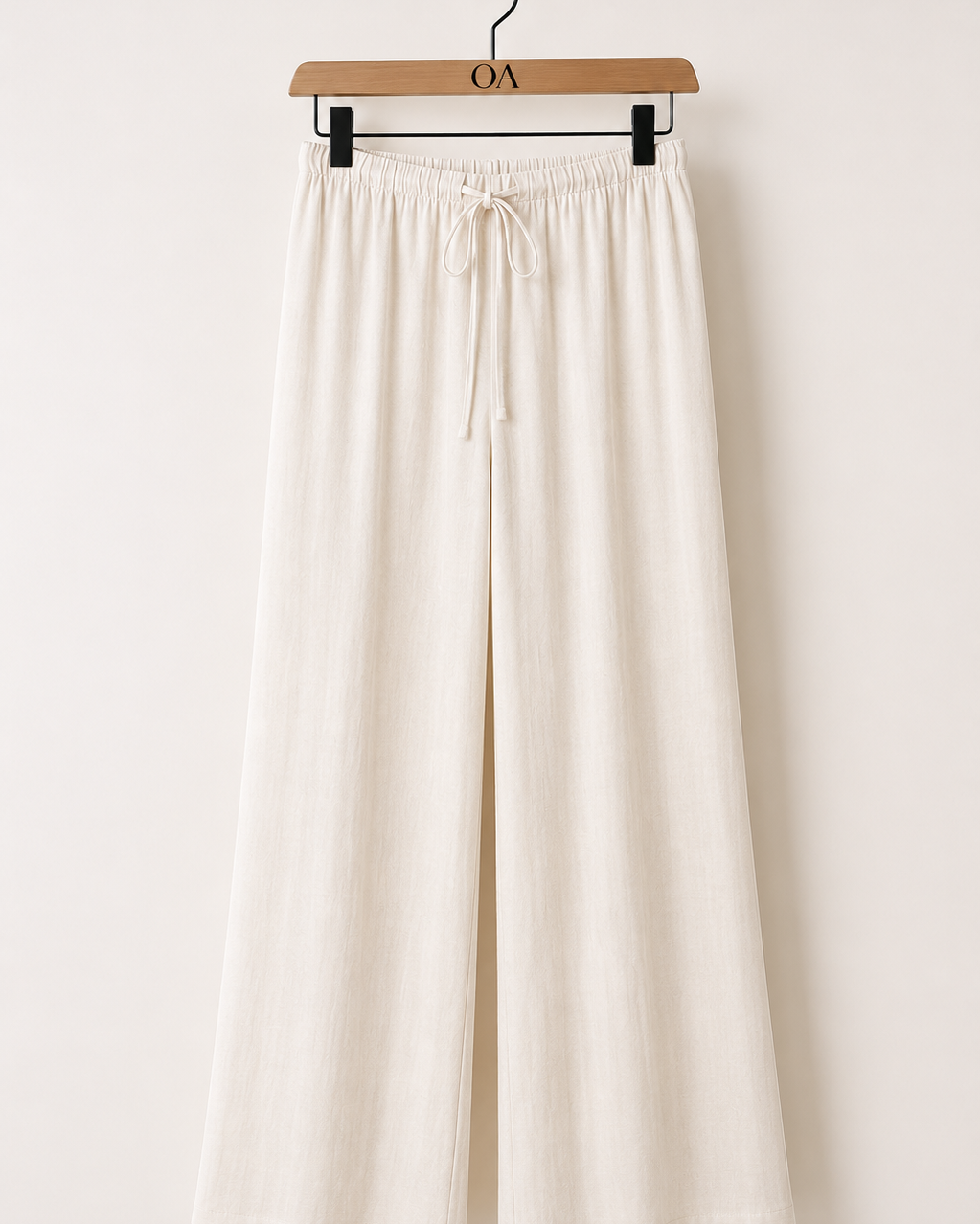 Calça Maria Claudia de cintura com elástico e cordão, pernas largas, cor creme