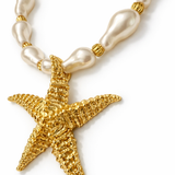 Colar com pingente estrela-do-mar dourada e contas pérola