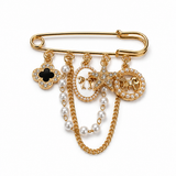 Broche Cleef dourado com alfinete e corrente, pingentes com pérolas e pedra escura