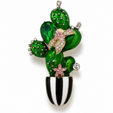 Broche cacto verde com pedras brilhantes e vaso preto e branco