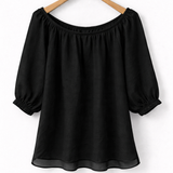 Blusa ombro a ombro preta com elástico na gola, mangas bufantes e saia ampla